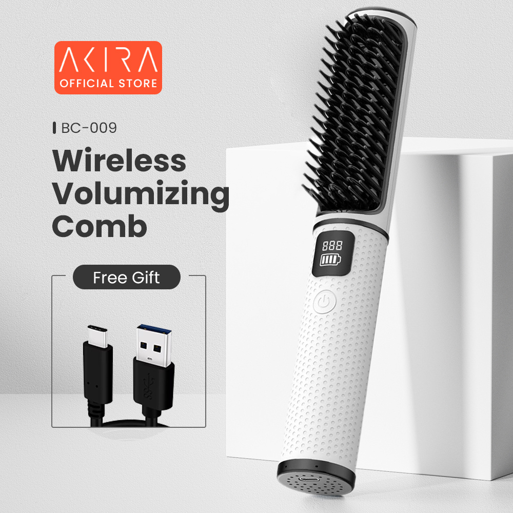 หวี Akira BC-009 ไร้สายสีขาววางบนโต๊ะ ดูเพรียวบางพกพา